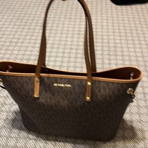 Authentic Michael Kors extra large brown tote.